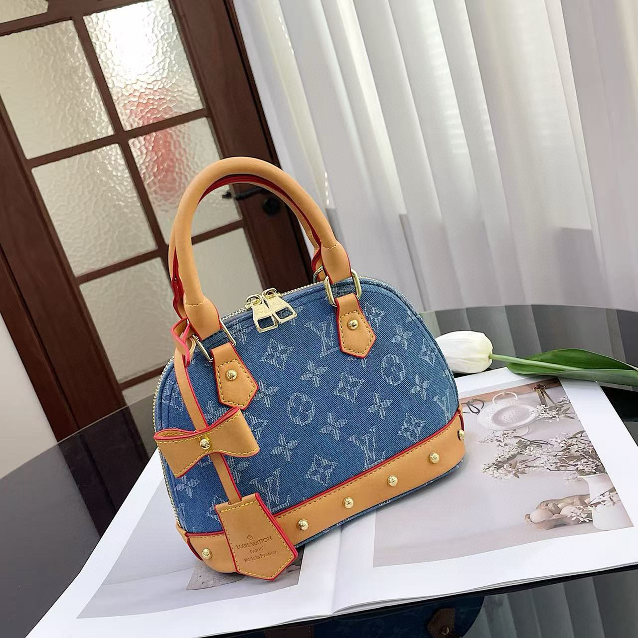 תיק יד לואי ויטון – תמונה 10