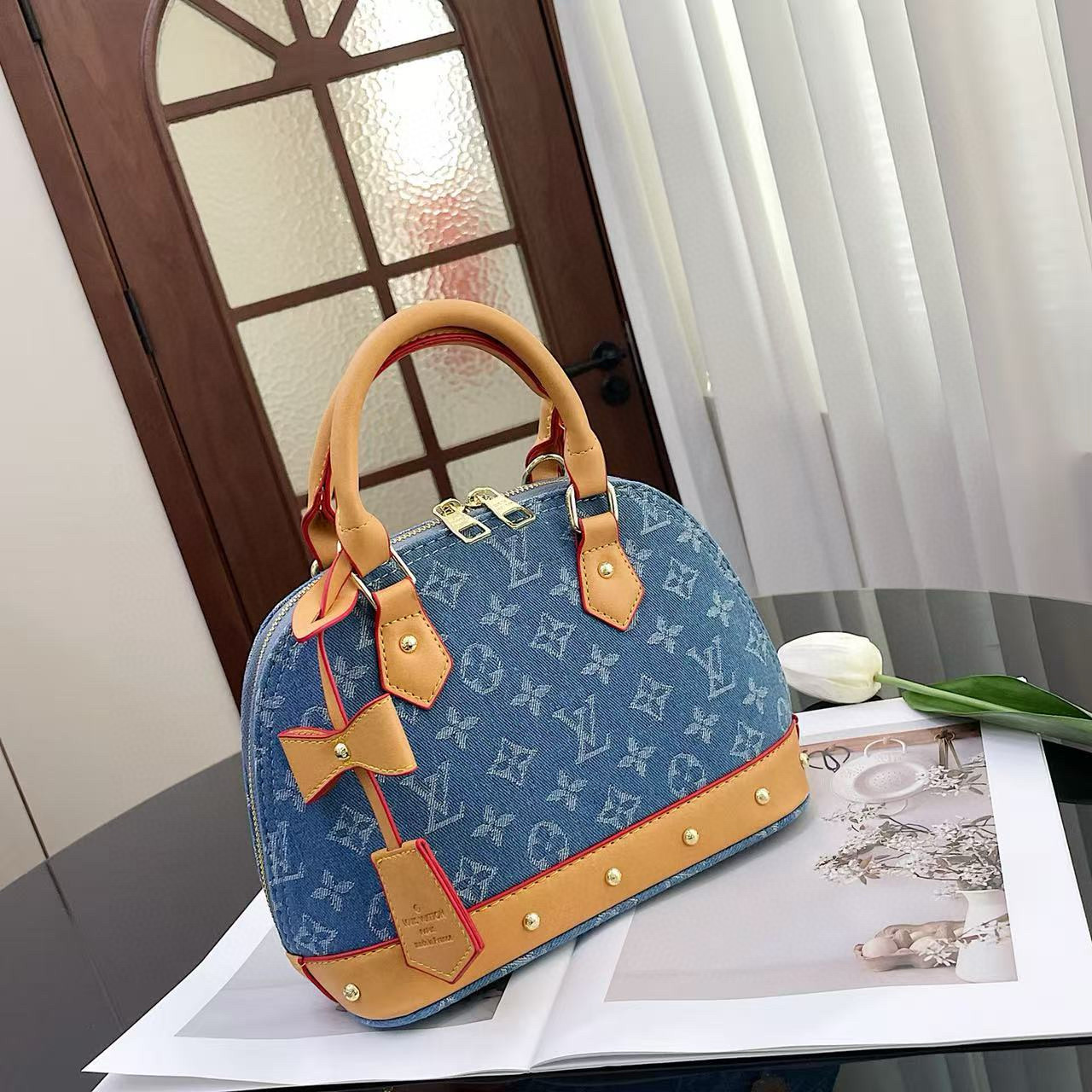 תיק יד לואי ויטון