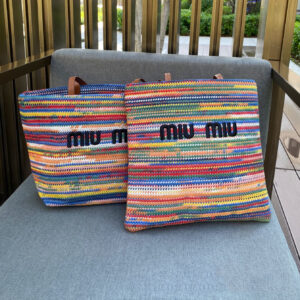 תיק פסים מיו מיו