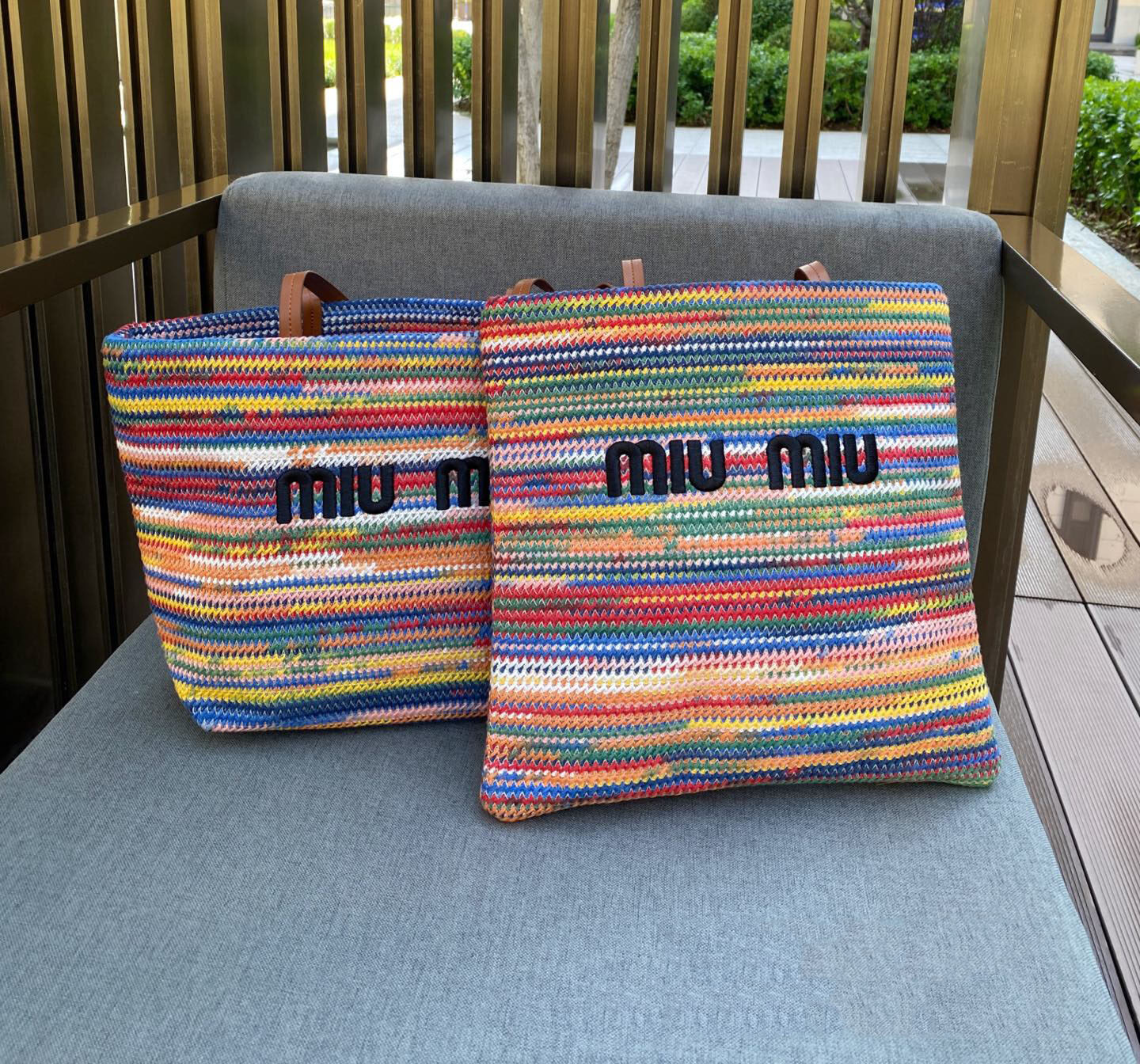 תיק פסים מיו מיו