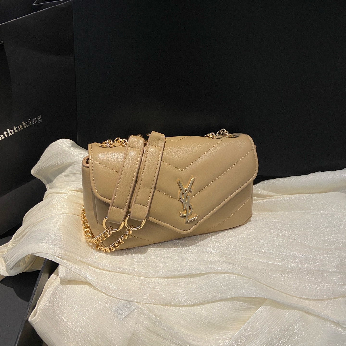 תיק צד איב סן לורן